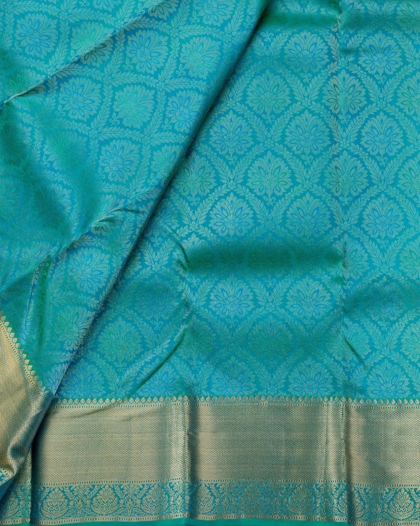Pure Handloom Kanchipuram Silk Saree with Traditional Floral Bloom and Leaf Arcs