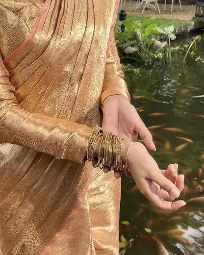 Liquid Gold - Pastel Peach Handwoven Pure Mulberry Brocade Silk Saree